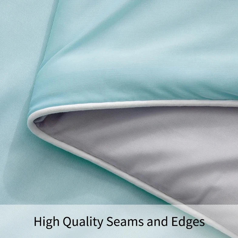 Close-up of double-side cooling blanket fabric, highlighting the smooth, cooling texture and dual-sided design for enhanced comfort